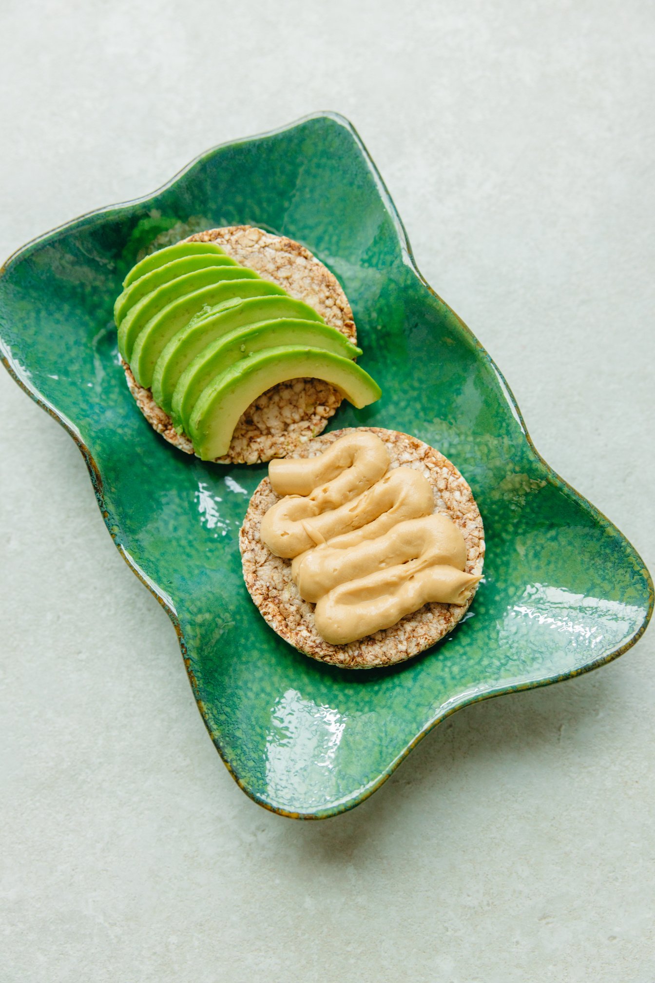 Brown and Green Cake on Green Ceramic Plate